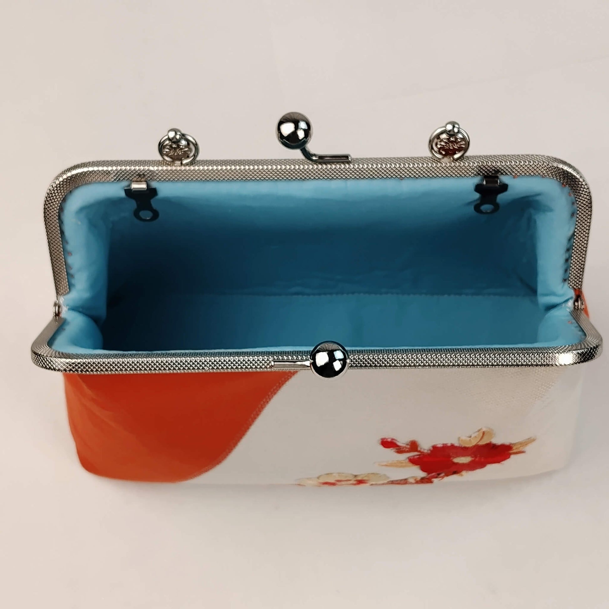 Interior view of Acever A001 plum blossom clutch bag showing smooth fabric-lined interior with ample space for essentials