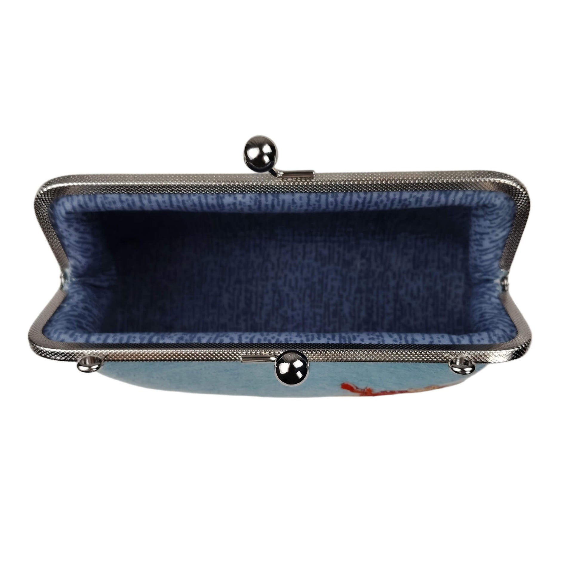Interior view of Acever A003 cherry blossom clutch bag open showing patterned fabric lining with spacious compartment containing phone wallet cosmetics and small accessories