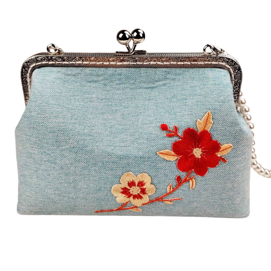 Acever A003 cherry blossom embroidered kiss-lock clutch bag main product shot showing powder blue linen-texture polyester body with red and cream floral embroidery and silver ornate filigree frame on white background