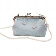 Acever B001 snowflake embroidered kiss-lock clutch bag main product shot showing ice blue polyester body with sheer tulle overlay silver glitter snowflakes and silver ornate filigree frame with large pearl bead crossbody strap on white background