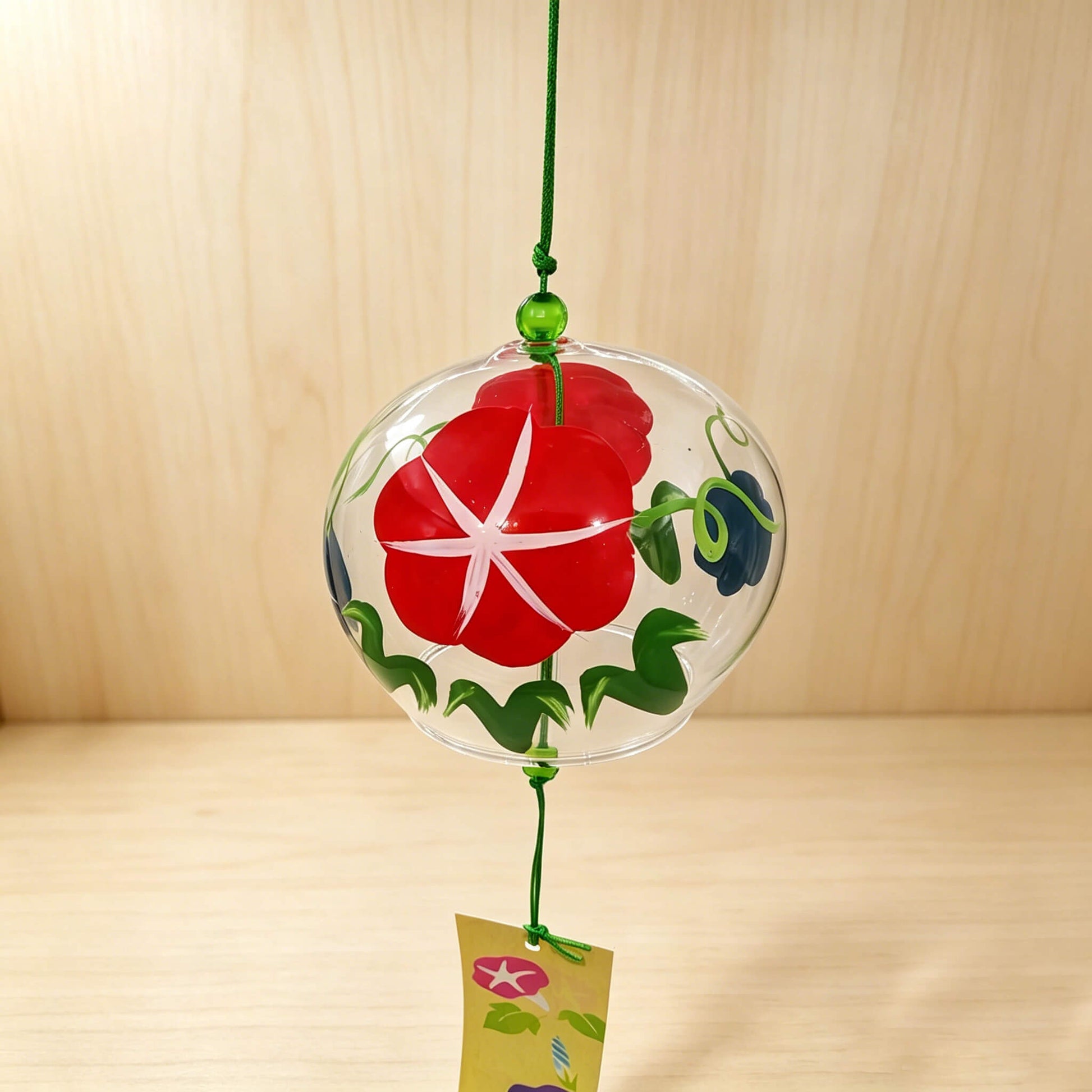 Acever morning glory glass wind chime X11 hanging from wooden beam showing red and blue asagao on clear globe