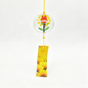 Main product shot of Acever Japanese furin glass wind chime X13 with sunflower design on clear flat-rim globe and golden sunflower photo paper strip on white background