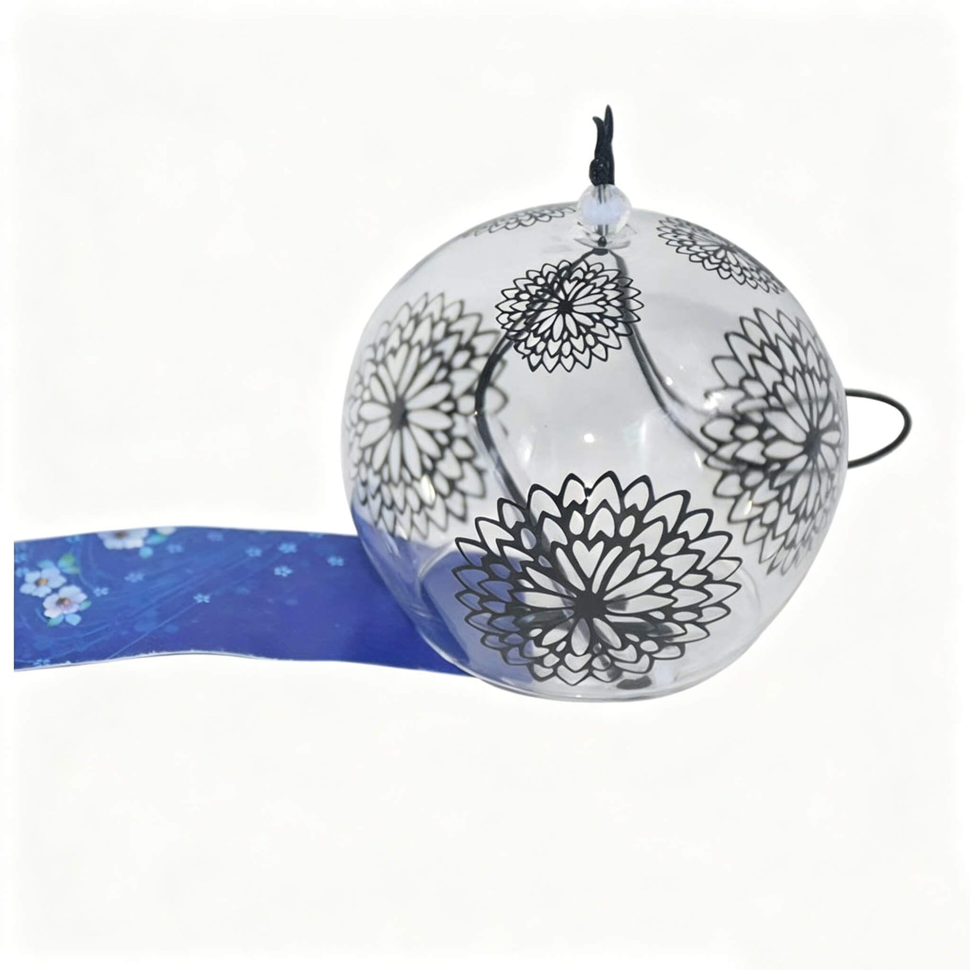 Acever black chrysanthemum mandala glass wind chime X17 resting on wooden rail showing flat-rim clear globe with bold black ink mandala and navy swirl paper strip