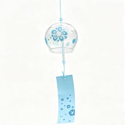 Product shot of Acever Japanese furin glass wind chime X19 with teal plum blossom ume design on clear flat-rim globe and sky-blue plum blossom paper strip on white background