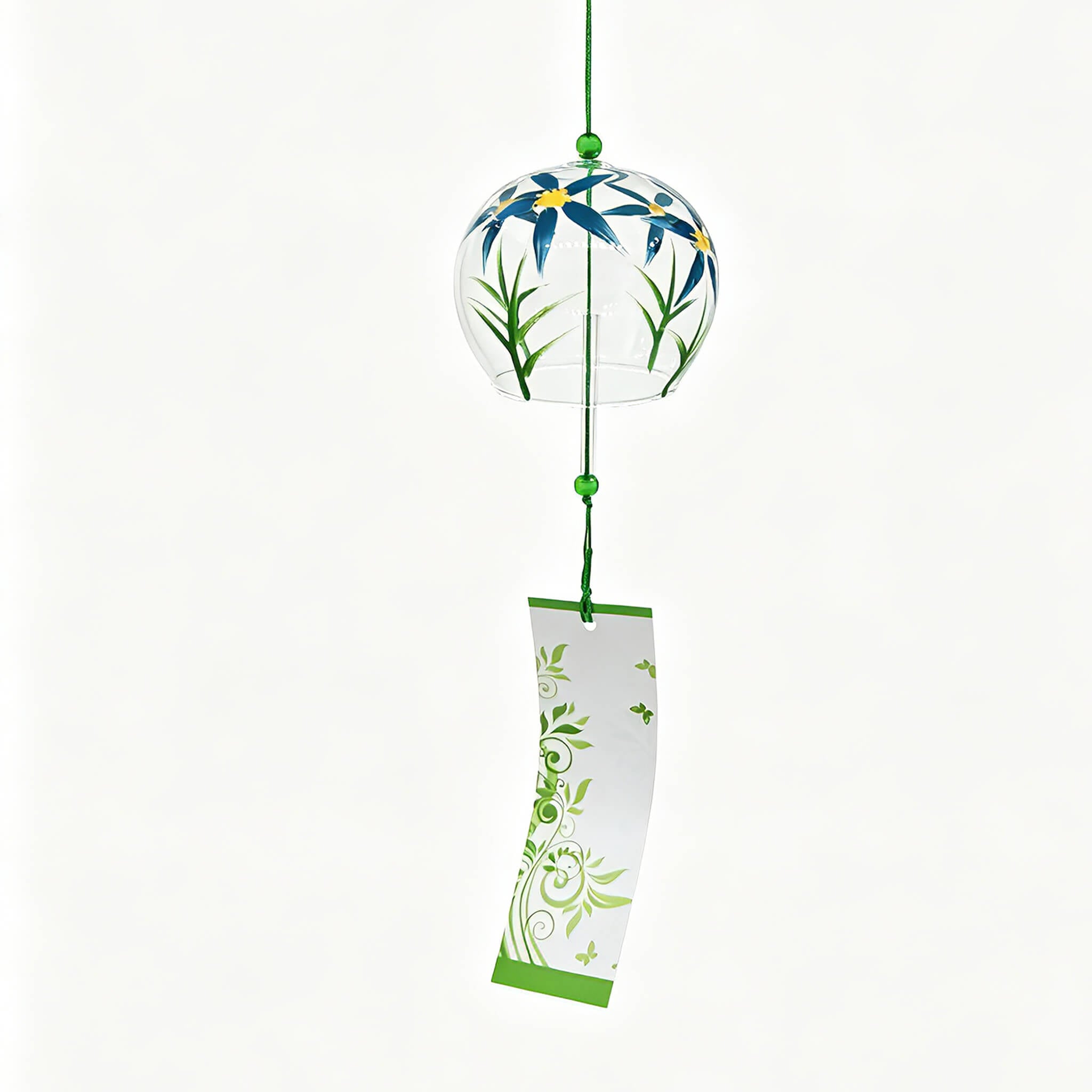 Main product shot of Acever Japanese furin glass wind chime X23 with blue daisy blossoms on clear globe and white paper strip with green vine scroll pattern on white background