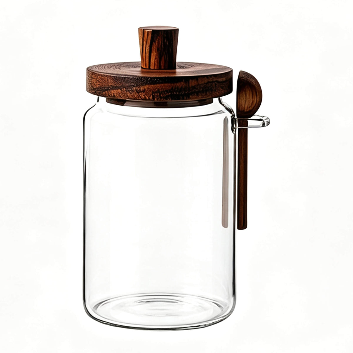 Clear smooth glass jar with solid wood knob lid and wooden spoon in glass side holder.