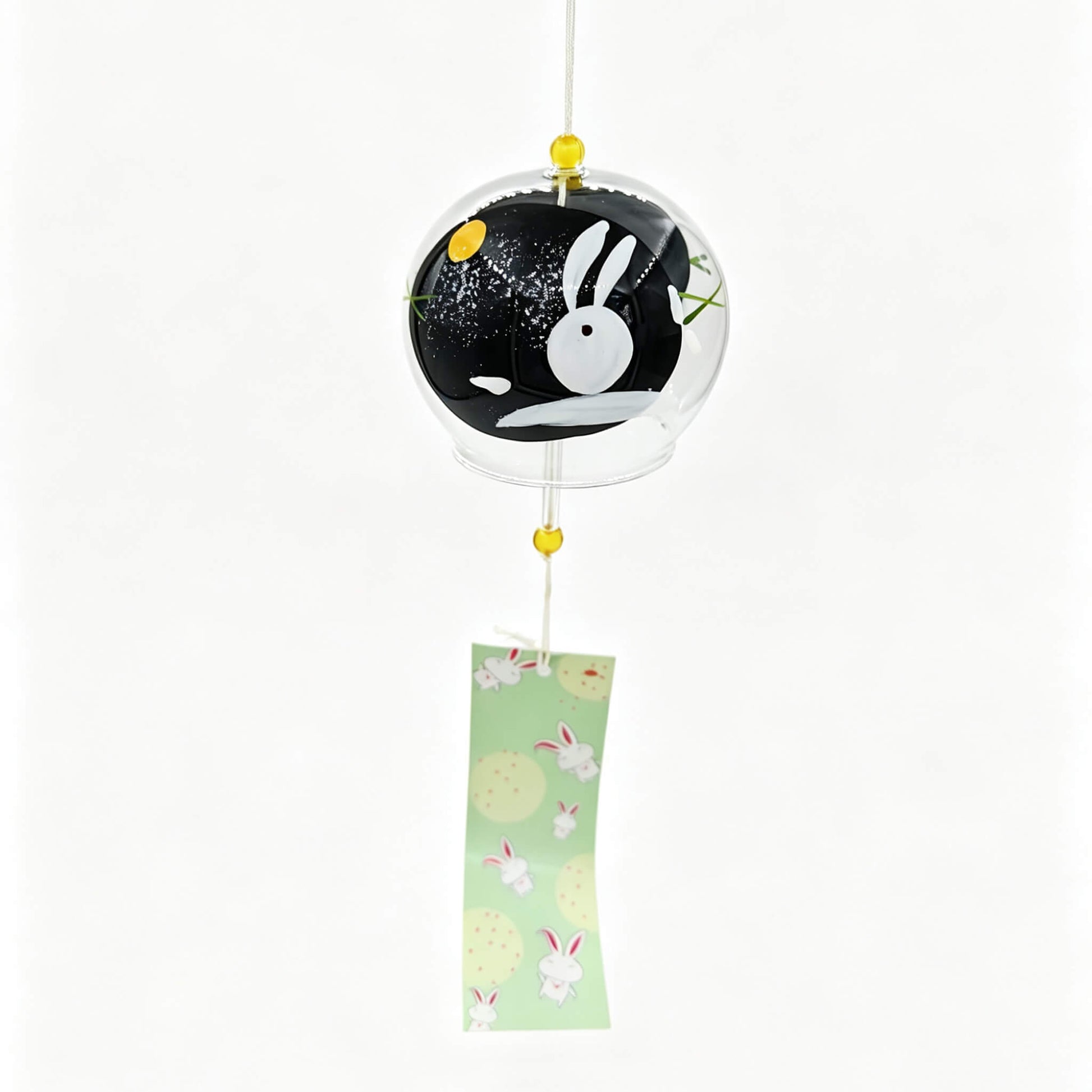 Acever Moon Rabbit glass wind chime X36 on white background showing full length with clear globe, black night sky interior with white rabbit silhouette and gold moon, yellow glass beads, and mint green bunny paper strip