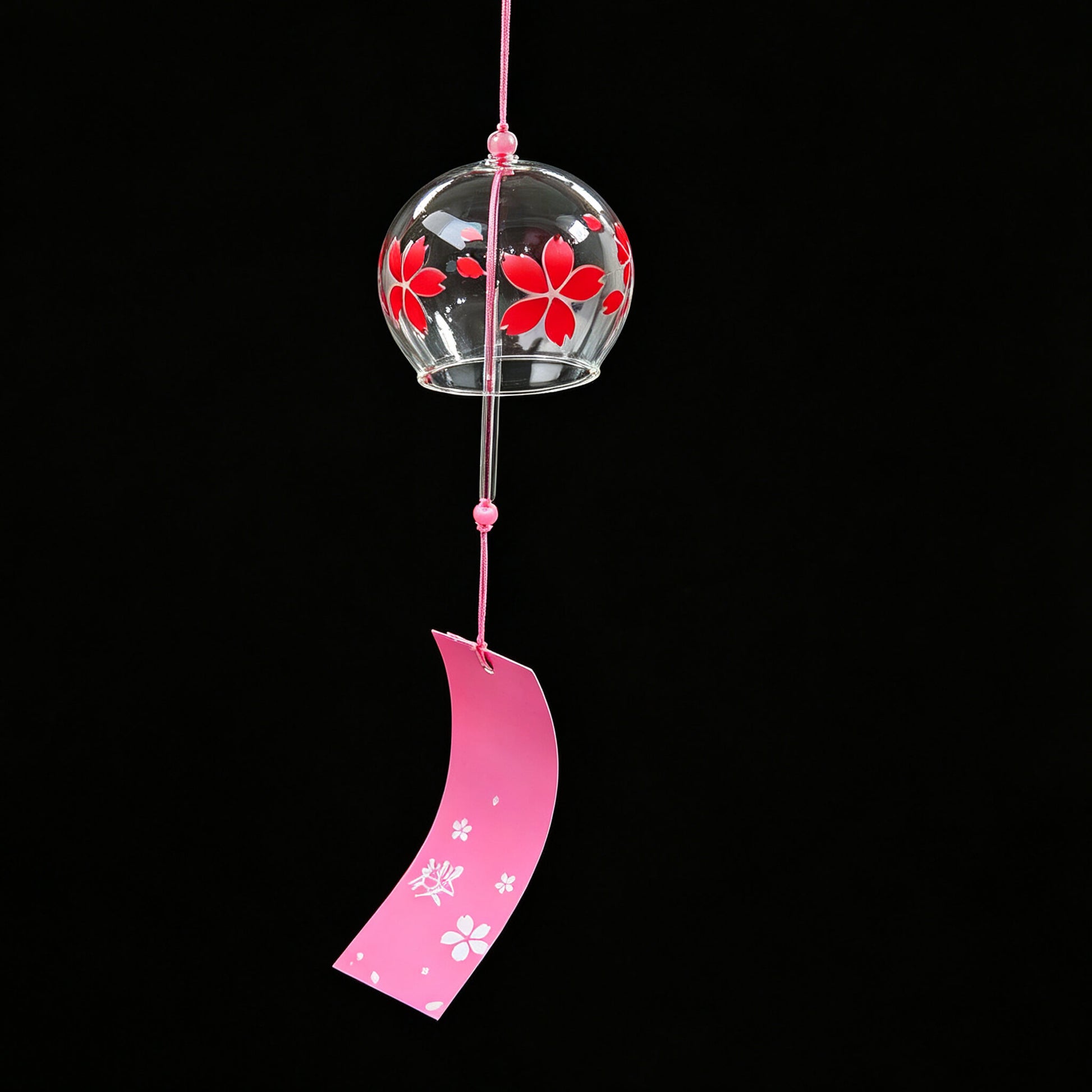 Acever red sakura glass wind chime X37 on black background showing full length with clear globe, bold red cherry blossom blooms and scattered petals, pink cord, and pink paper strip with white sakura and sakura kanji