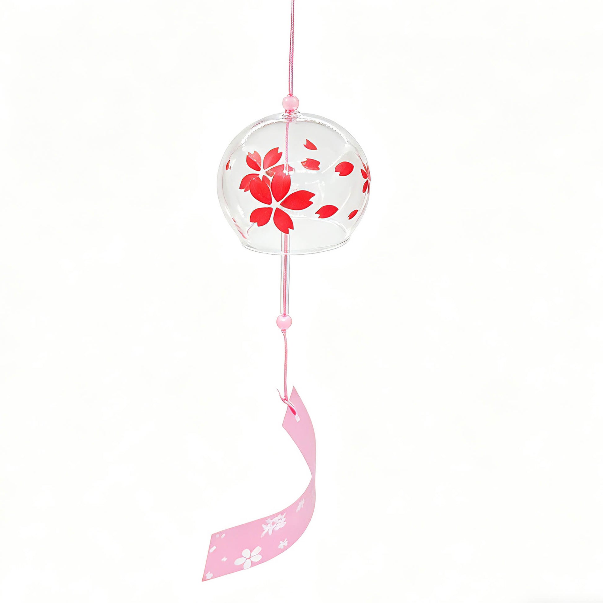Side view of Acever red sakura glass wind chime X37 on white background showing clear globe profile with bold red cherry blossom blooms, pink cord with glass beads, and pink paper strip with white sakura scatter