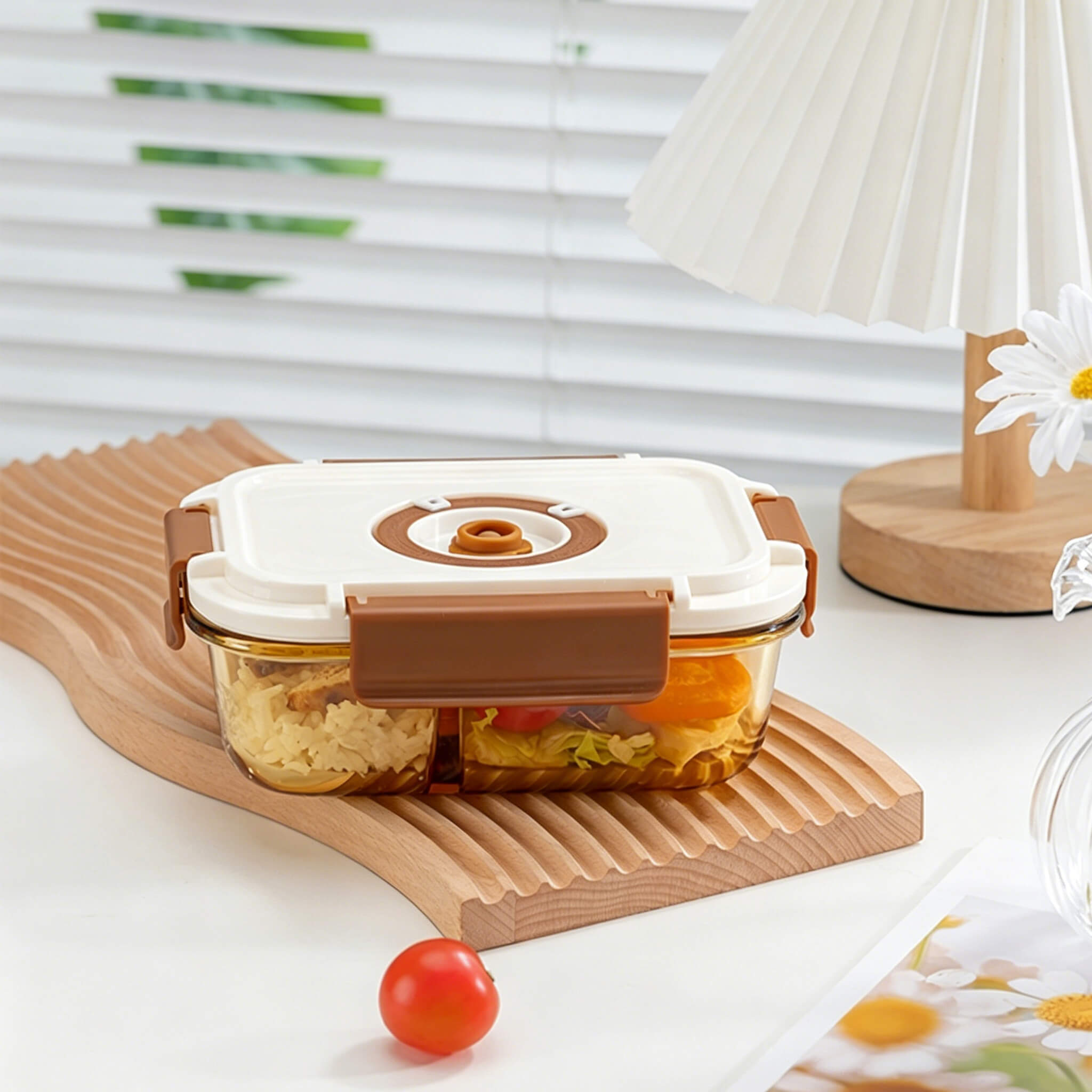 Side view of Acever BX04 2-compartment glass food container showing amber glass body depth and cream lid with brown locking clips