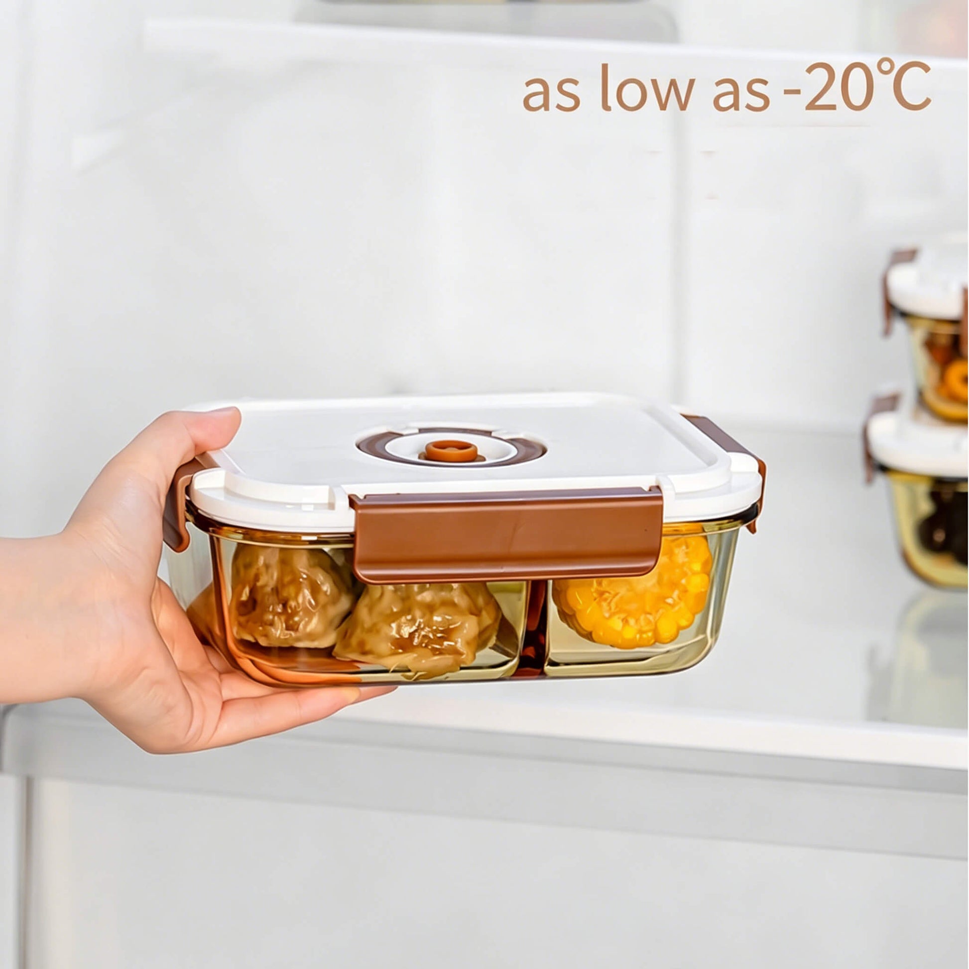 Acever BX05 large 2-compartment glass food container stored in fridge showing amber glass body with food visible through glass and airtight lid locked