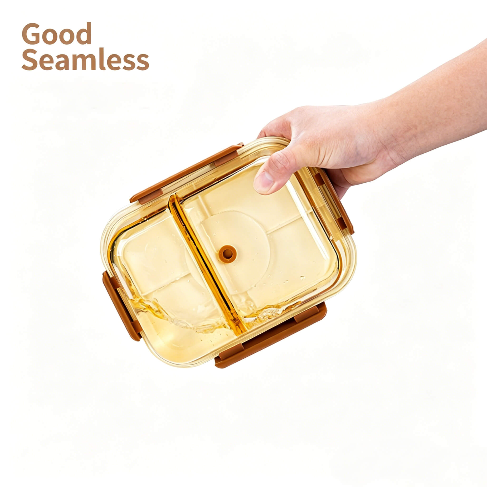 Hand holding Acever BX05 large 2-compartment glass food container upside down demonstrating seamless leak-proof airtight seal with Good Seamless label