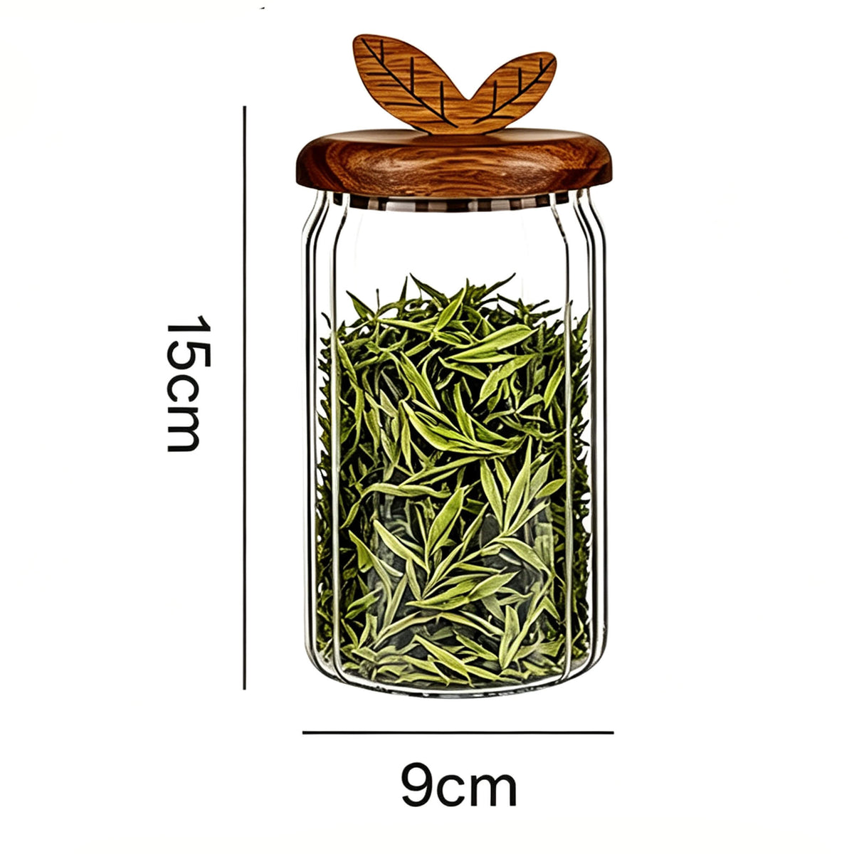 600ml ribbed glass jar with leaf handle wooden lid filled with green tea leaves showing 15cm height and 9cm width dimensions.